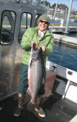 Ila Dillon with king salmon, Seldovia boat harbor, Alaska